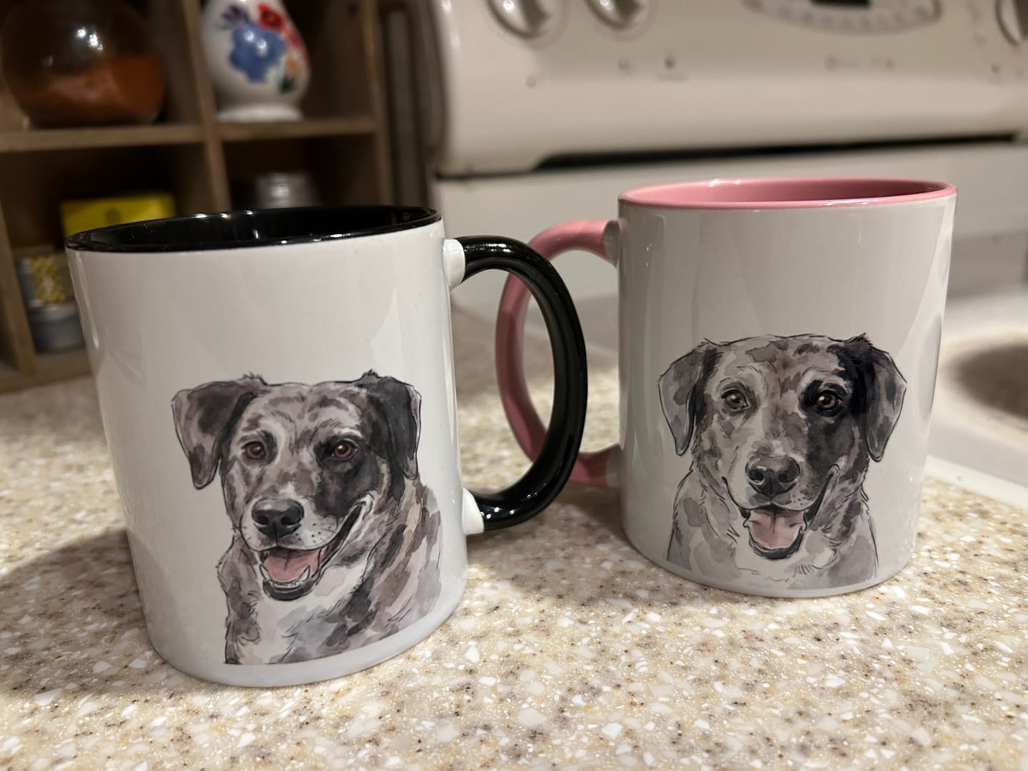 Two matching mugs with a dog portrait